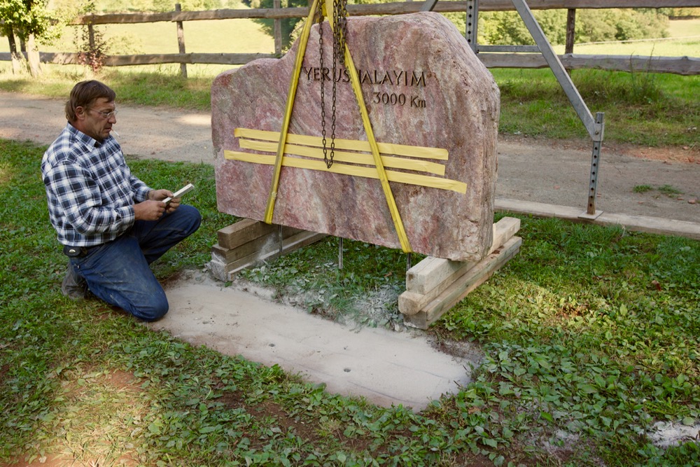 Jerusalem Border stone is put on the foundation