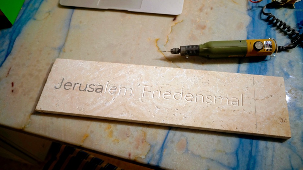 Milling the inscription